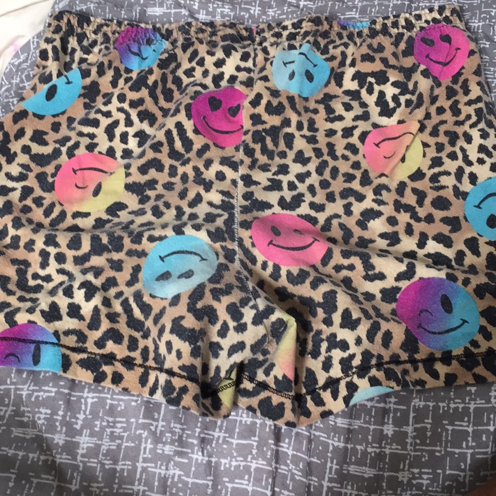 I’m selling some grey shorts, smiley face shorts